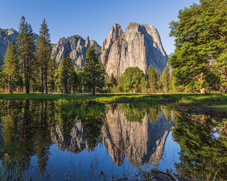 Photograph of Cathedral Rocks in Yosemite valley with Reflections