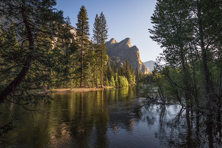 Photograph of the Three Brothers taken at Cathedral Beach in Yosemite Valley